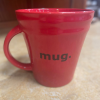 Red Mug with the word MUG.